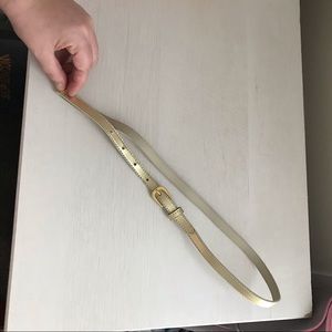 Skinny metallic gold belt